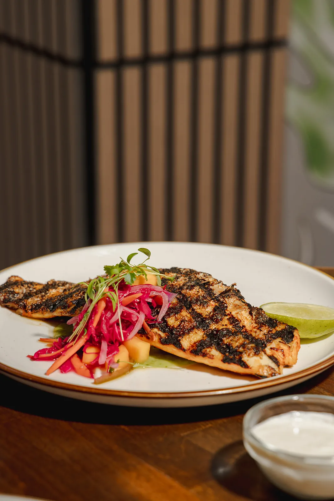Snapper a la talla with adobo de guajillo and pickled onion