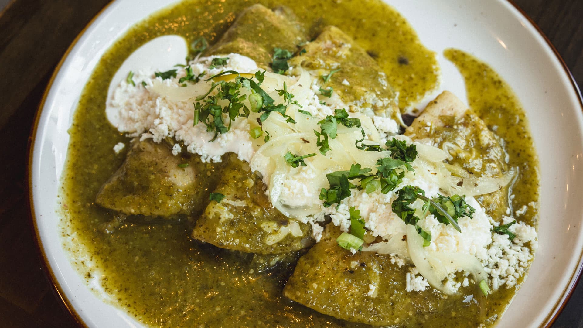 A trio of tacos on handmade nixtamal tortillas