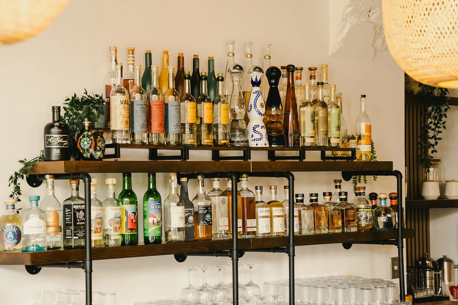 The back bar at Crown Cantina, lined with tequila and mezcal bottles